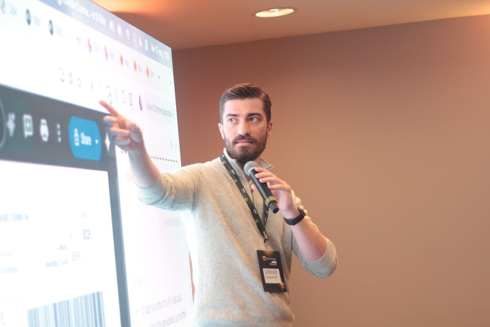 Gianluca Giuliani speaking on stage